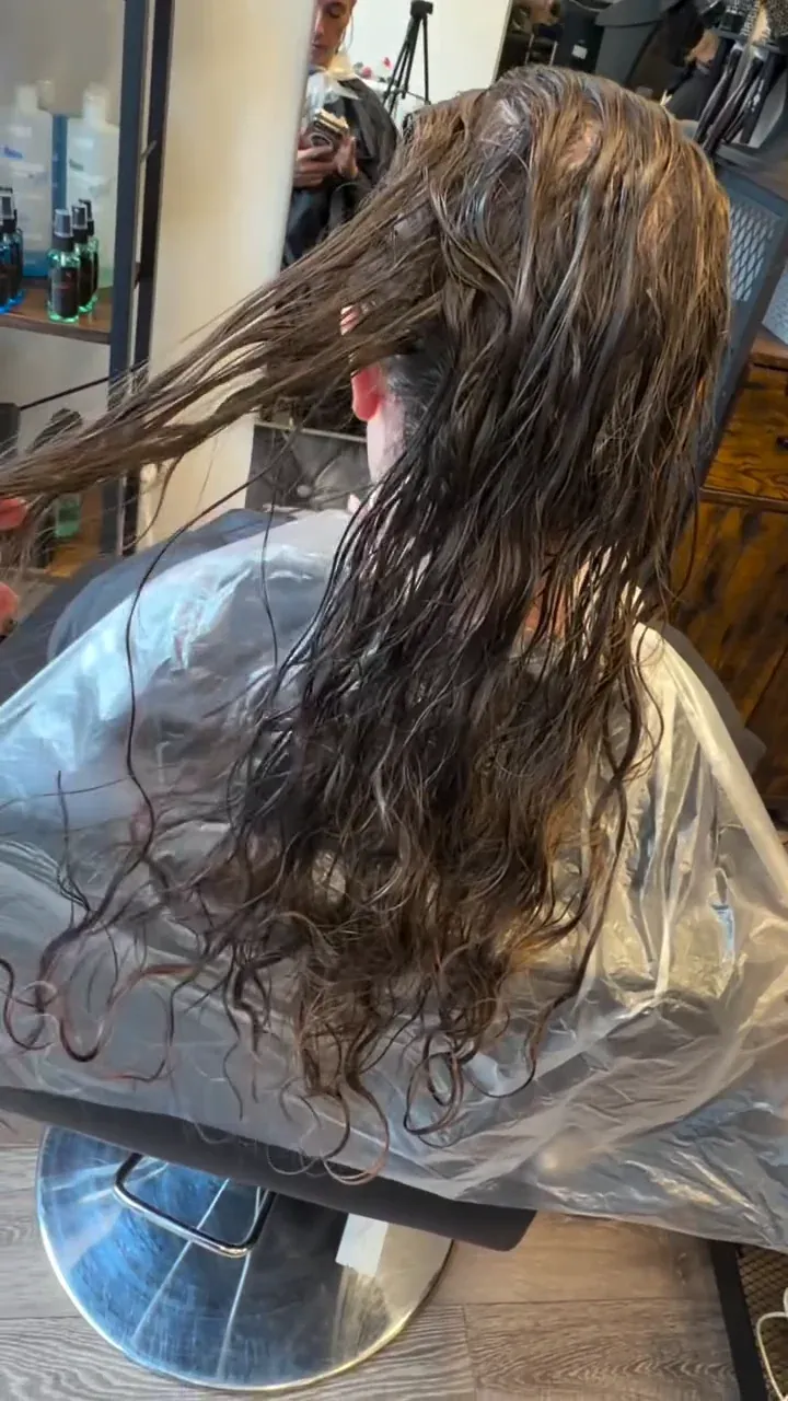 Hair being prepared with a cold reconstruction treatment